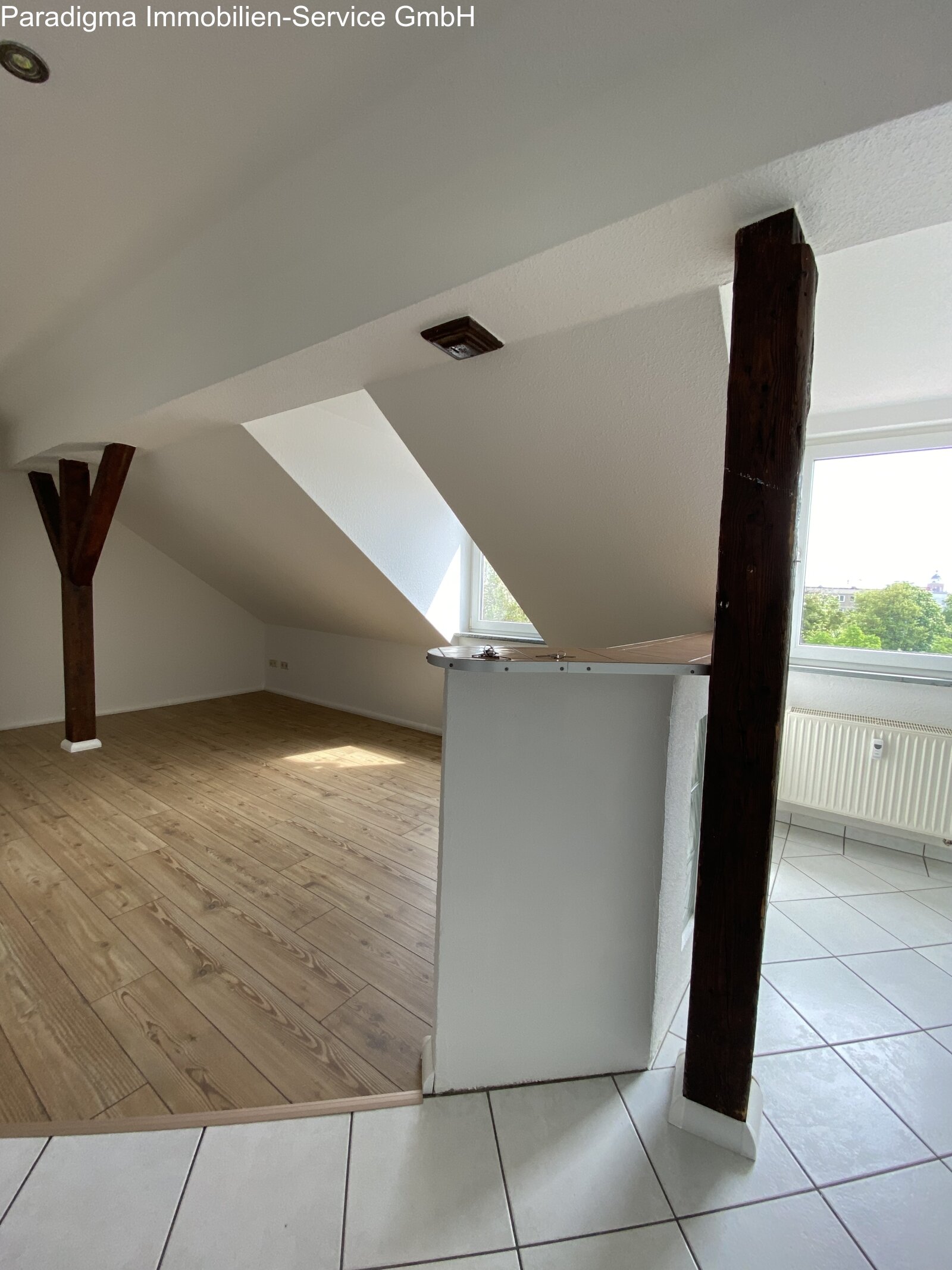 Gemütliche 2-Raum-Wohnung im Dachgeschoss mit Einbauküche!